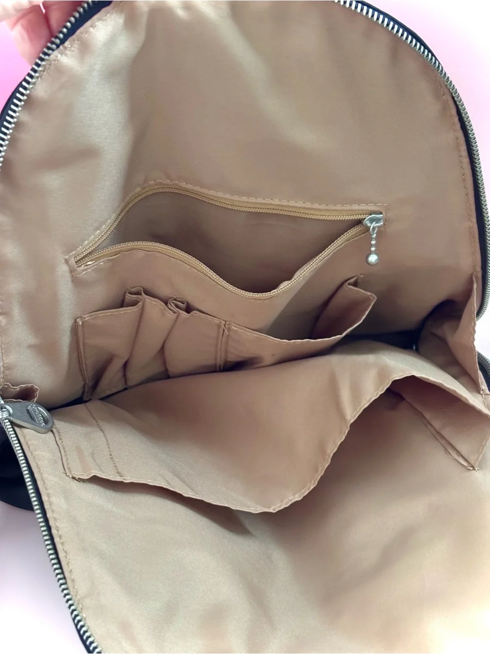 Baggallini Black Sling Cairo Backpack with Turn-Lock Detail-